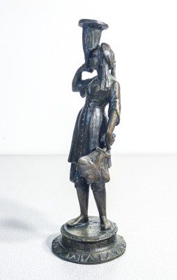 Coppia di portacandele in bronzo raffiguranti due moretti, una donna e un uomo. Fine Ottocento Primo Novecento