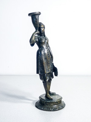 Coppia di portacandele in bronzo raffiguranti due moretti, una donna e un uomo. Fine Ottocento Primo Novecento