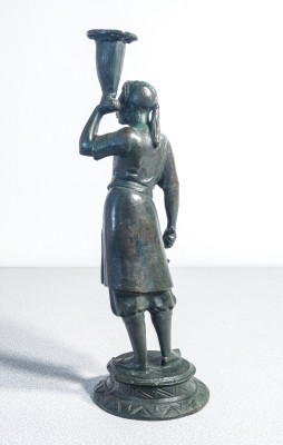 Coppia di portacandele in bronzo raffiguranti due moretti, una donna e un uomo. Fine Ottocento Primo Novecento