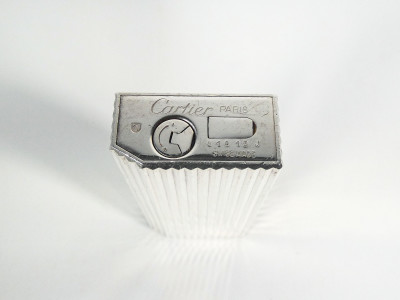 Tris di accendini vintage, due CARTIER e un DUNHILL. Anni 80