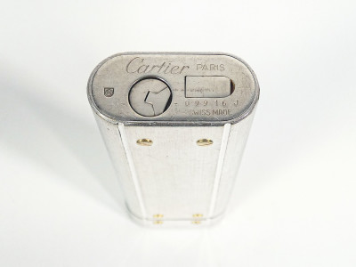 Tris di accendini vintage, due CARTIER e un DUNHILL. Anni 80